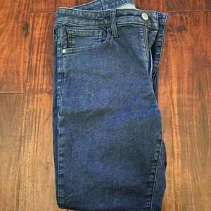 Men’s Express dark blue jeans.